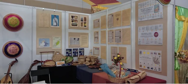 Historical documents and objects arranged in the exhibition space