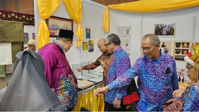 Visitors viewing the historical exhibition