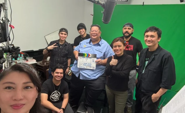 The documentary crew gathered for a photograph